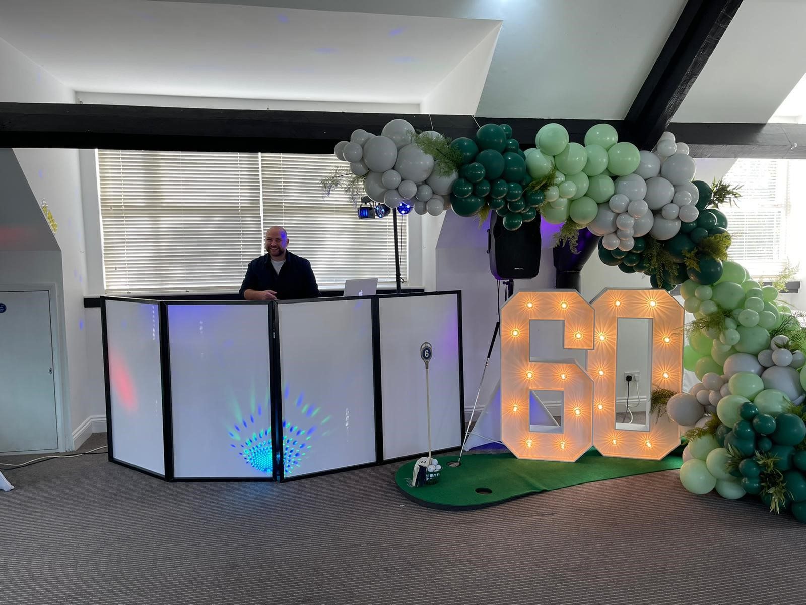 A 60th birthday party in the function suite, with a DJ